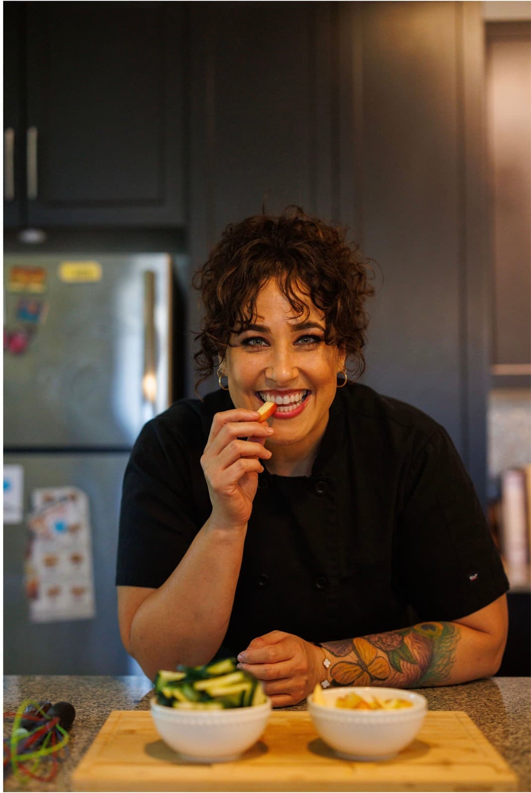 Chef Jenna Dancer smiling in her kitchen
